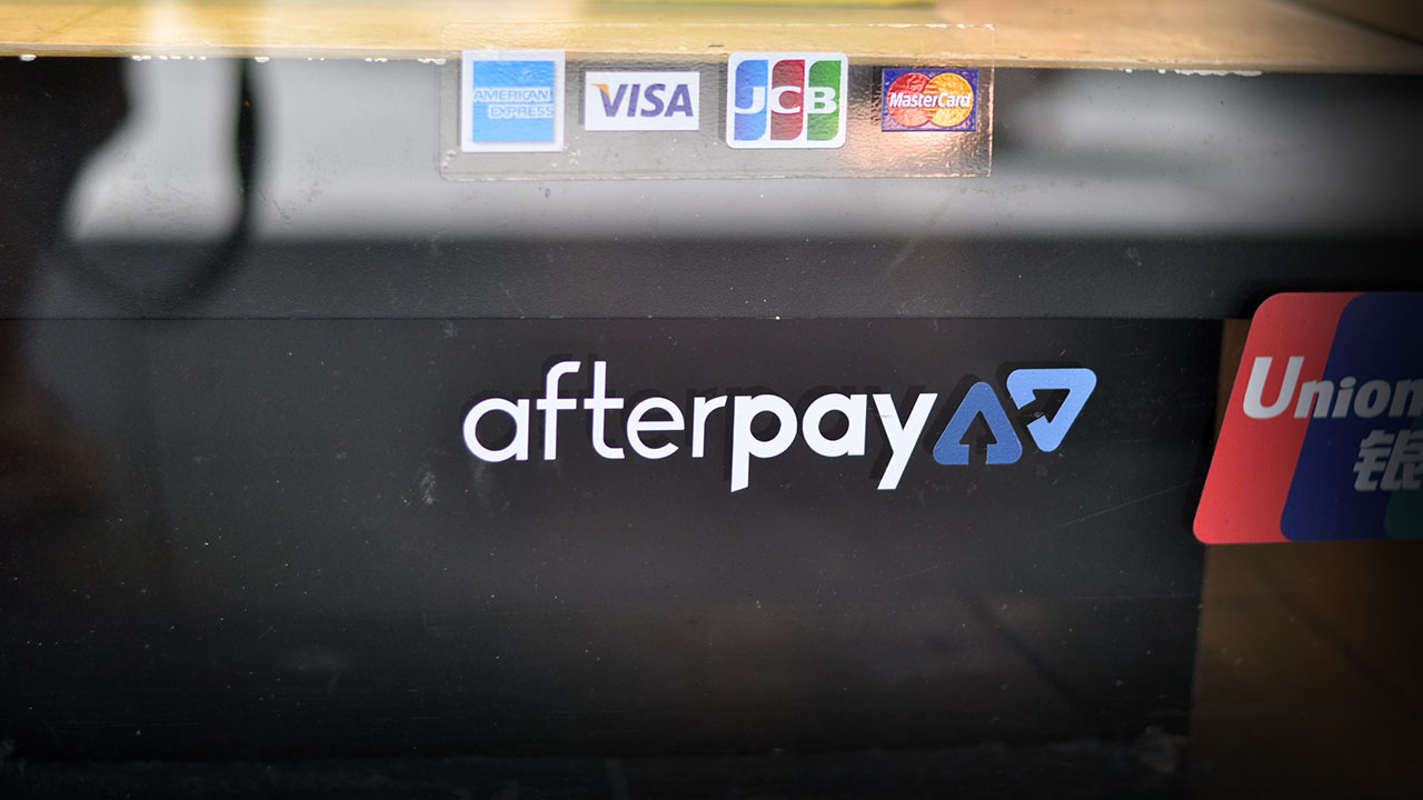 Afterpay logo as seen in a shop window