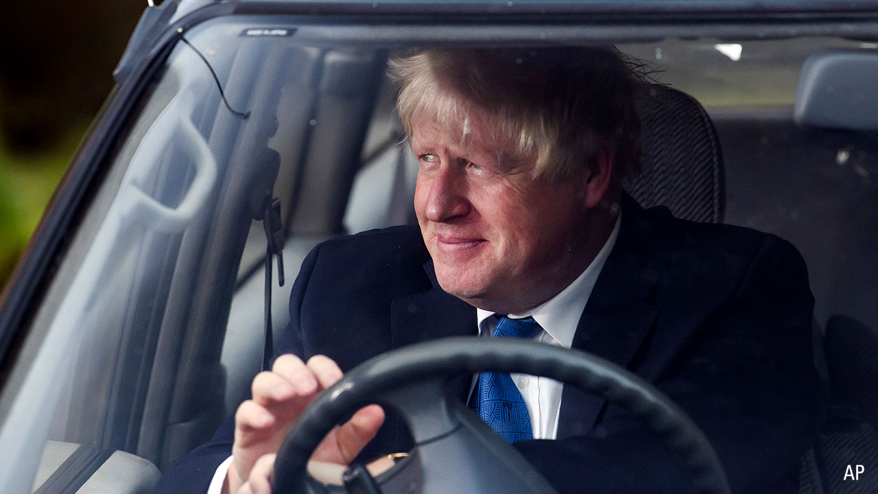 Boris Johnson behind wheel of car
