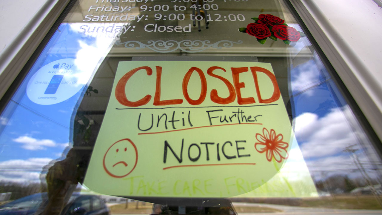closed sign in shop window